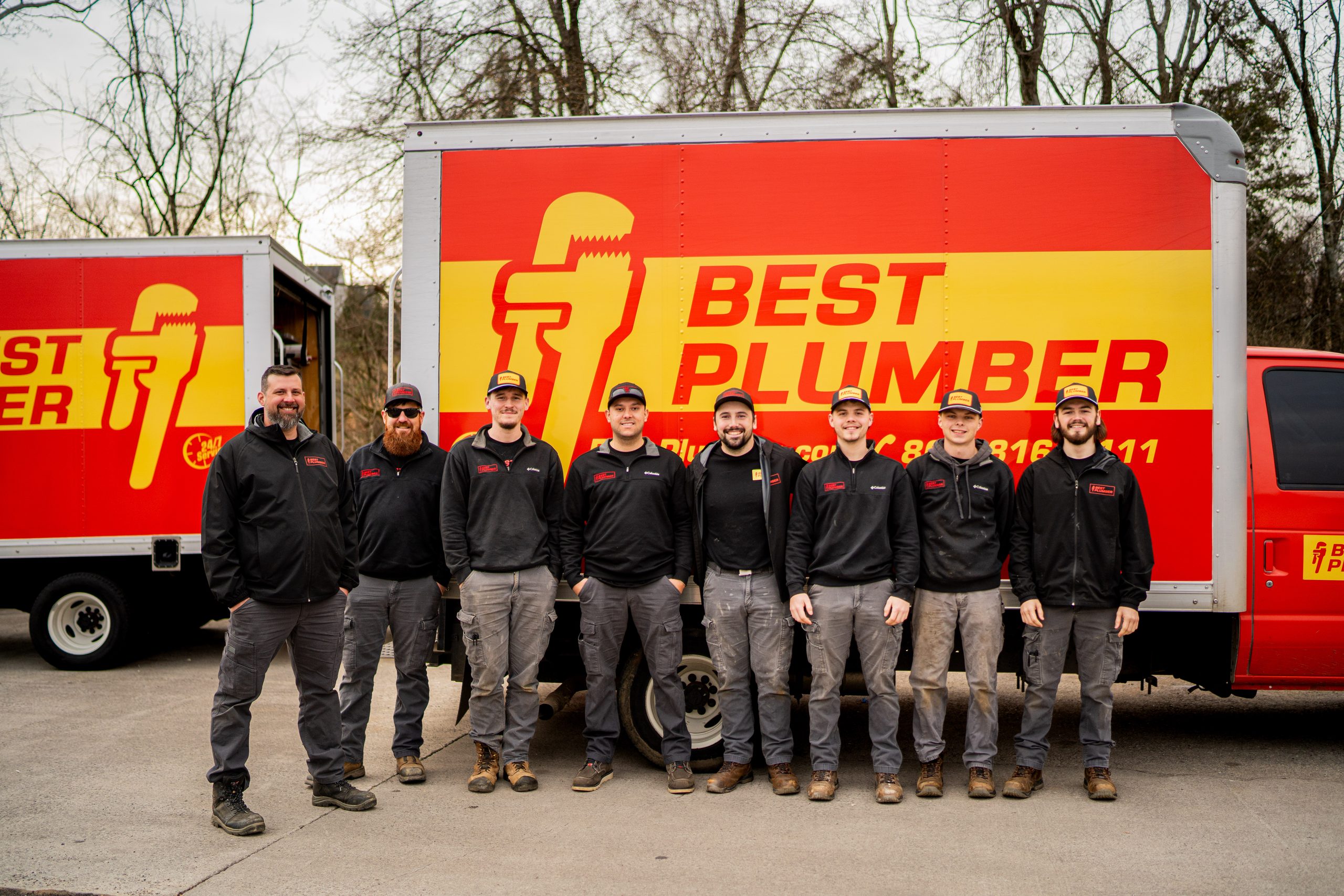 The Best Plumber Knoxville team standing in front of a Best Plumber service truck